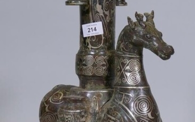 A bronze censer in the form of a deer,...
