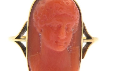 A carved coral ring.Ring size S1/2. 6.5gms.Coral untested....