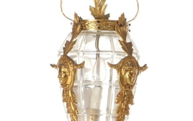 A circa 1900 gilt bronze hall chandelier, richly cast with masks and foliage. H. 65. Diam. 27 cm.