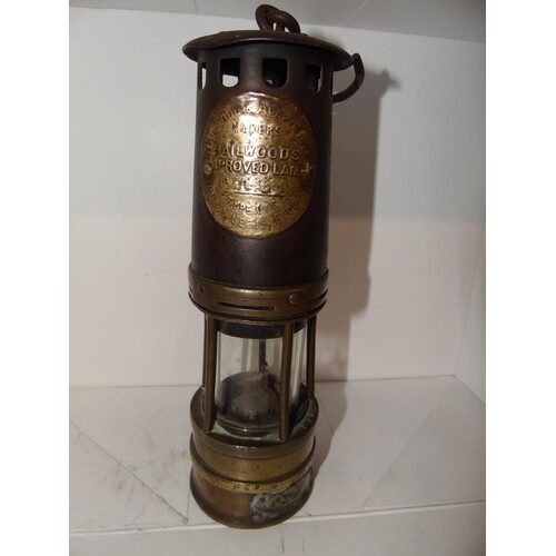 A collectable Hailwoods & Ackroyd miners lamp