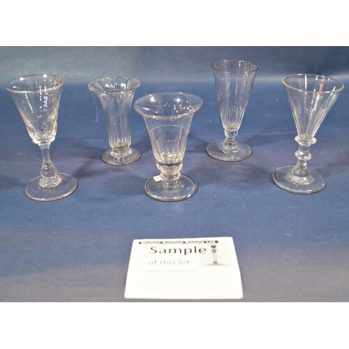 A collection of fourteen stemmed wine glasses of varying des...