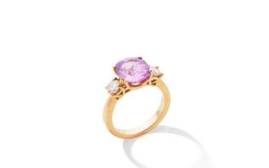 A coloured sapphire and diamond ring