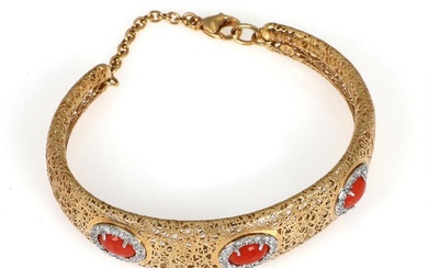 A coral and diamond bracelet set with three cabochon corals encircled by...