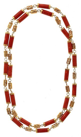 A coral necklace, designed as a row of cylindrical coral beads to spacers pierced with a geometric design, detachable into a necklace and bracelet length 20cm and 69cm