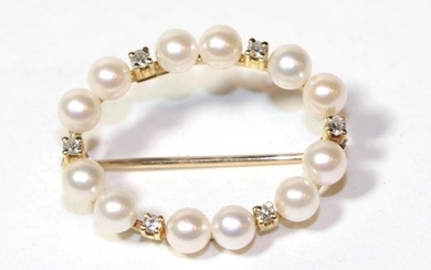 A cultured pearl and diamond hoop brooch, stamped 'CB 750',...