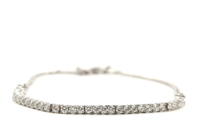 SOLD. A diamond bracelet set with numerous brilliant-cut diamonds, totalling app. 0.90 ct. mounted in...