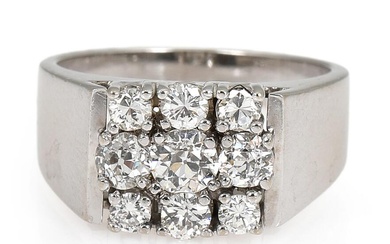 A diamond ring set with numerous brilliant-cut diamonds, mounted in 14k white...