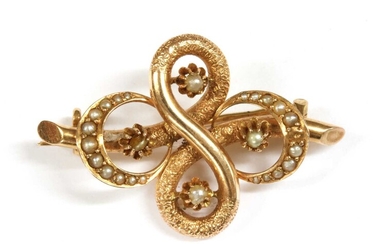 A gold split pearl brooch