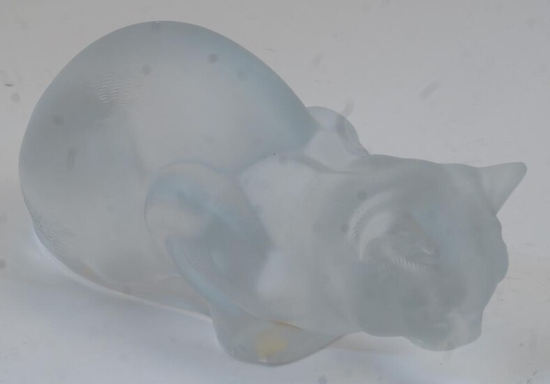 A modern Lalique frosted glass pouncing cat, etched signature 'Lalique R France' to the underside, 23cm long