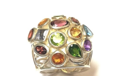 A modern multi gemstone ring