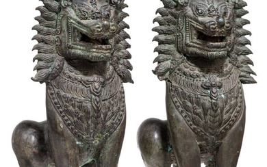 A pair of Burmese bronze temple lions, 19th century