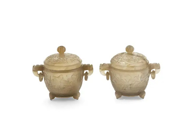 A pair of Chinese agate tripod handled bowls and covers Late Qing...