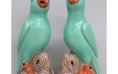 A pair of Chinese polychrome porcelain models of parrots, 22...