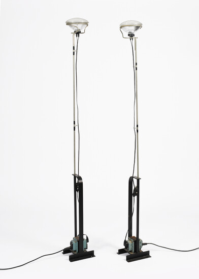 A pair of Flos Toio floor lamps designed by Achille Castiglioni