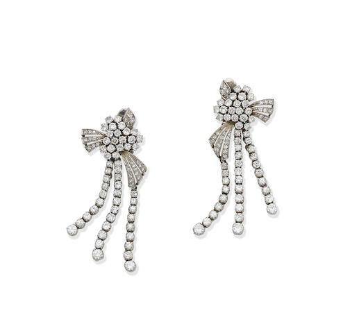 A pair of diamond pendent earclips
