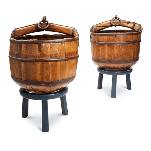 A pair of hardwood coopered well buckets, probably Chinese, ...