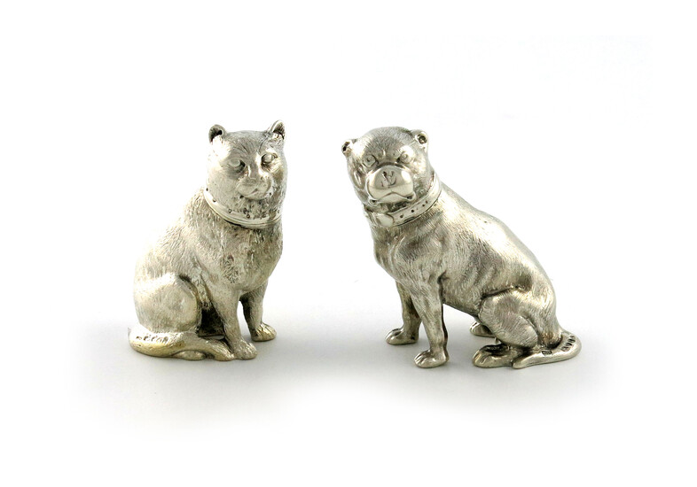 A pair of late-Victorian novelty silver dog and cat pepper pots