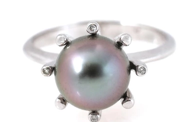 A pearl ring set with a cultured Tahiti pearl and four brilliant-cut...