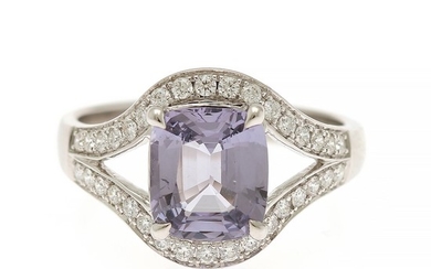 A spinel and diamond ring set with a cushion-cut lavender spinel, app. 2.05 ct., and numerous brilliant-cut diamonds, mounted in 18k white gold. Size 53.
