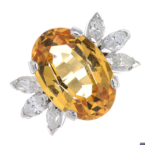 A yellow topaz and diamond cocktail ring.