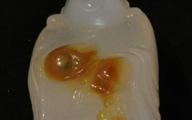 AN AGATE PENDANT CARVED WITH BUDDHA