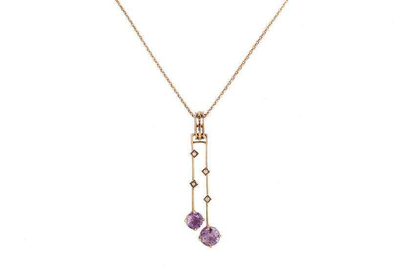 AN AMETHYST AND SEED PEARL PENDANT AND CHAIN, in 8ct gold, 3...