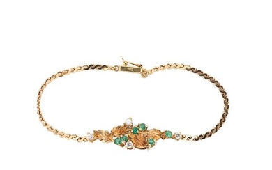 An 18ct gold emerald and diamond bracelet