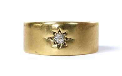An 18ct gold star set diamond ring