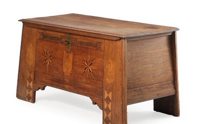 An 18th century Frisian oakwood chest, decorated with star shaped intarsia, carved...