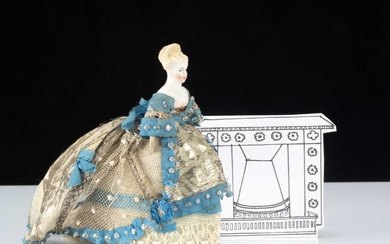 An 19th century beautifully dressed bisque shoulder head dolls’ house doll
