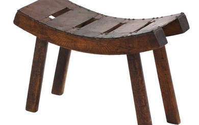 An Arts and Crafts 'Egyptian' pine stool