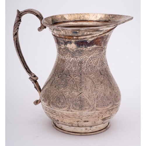 An Egyptian silver water jug, stamped marks: of ovoid form w...
