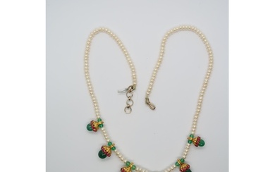 An Indian pearl and emerald necklace - The single string of ...