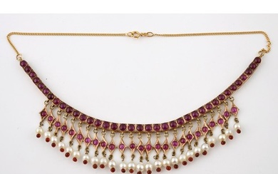 An Indian yellow coloured metal, synthetic ruby and seed pea...