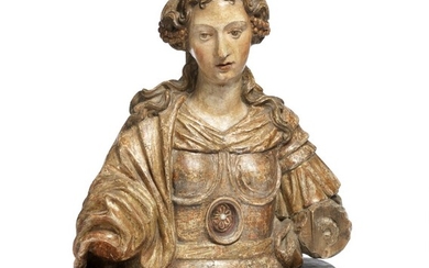 An Italian late Baroque bust. 17th century. H. 39 cm. Based onto a later base of wooden faux marbre.