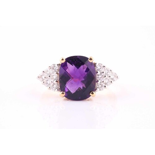 An amethyst and diamond ring, the faceted cushion shape amet...