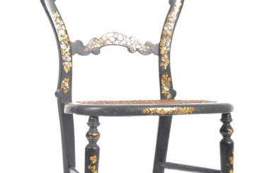 An early 19th century Regency Chinoiserie children's side dining chair. Black lacquer ground with hand gilded and mother of pearl decoration throughout. Shaped backrest leading to woven cane seat over faux bamboo legs. Measures approx. 74 x 39 x 37cm.
