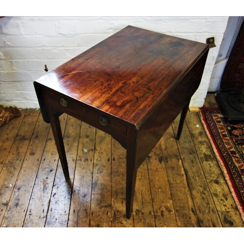 An early 19th century mahogany Pembroke table, with a single...