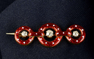 An early 20th century 15ct gold old-cut diamond, red guilloché and white spot enamel brooch.