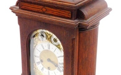 An early 20thC Junghans oak cased mantel clock, rectangular...