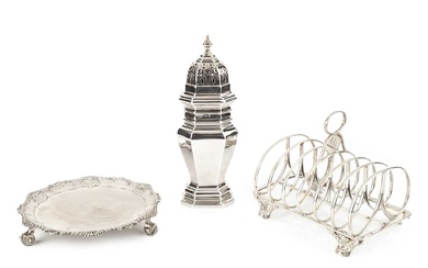 An early Victorian silver seven bar toast rack, the shaped...