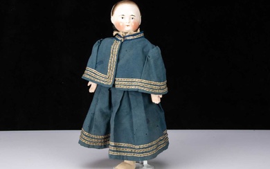 An unusual 19th century china headed girl doll