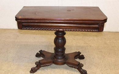 Antique empire mahogany paw foot flip top game table