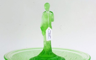 Art Deco green glass table centre piece, having a figure of a semi-naked lady within a floral