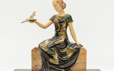Art Deco spelter figure of a lady holding a dove...