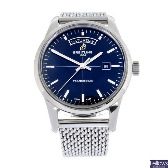 BREITLING - a stainless steel Transocean Day & Date bracelet watch, 43mm.