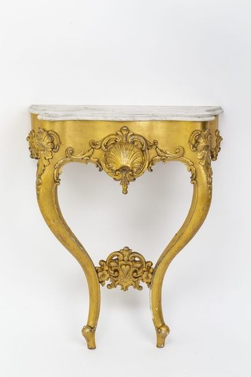 Baroque style console. Carved and stuccoed, gilded. Flaking...