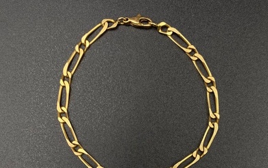 Bracelet souple en or jaune 750/1000 (18K) maille figaro Longueur : 21,0 cm Poids :...