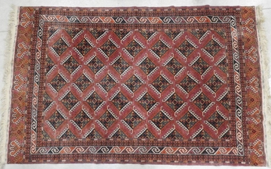 CAUSE: Wool carpet with geometric decoration on a...