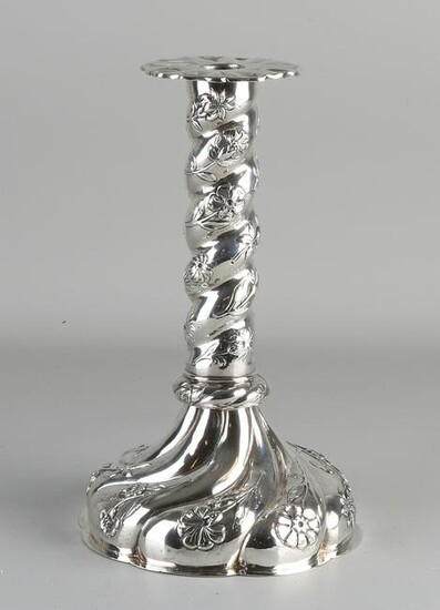 Capital silver candlestick, 833/000, on a large round